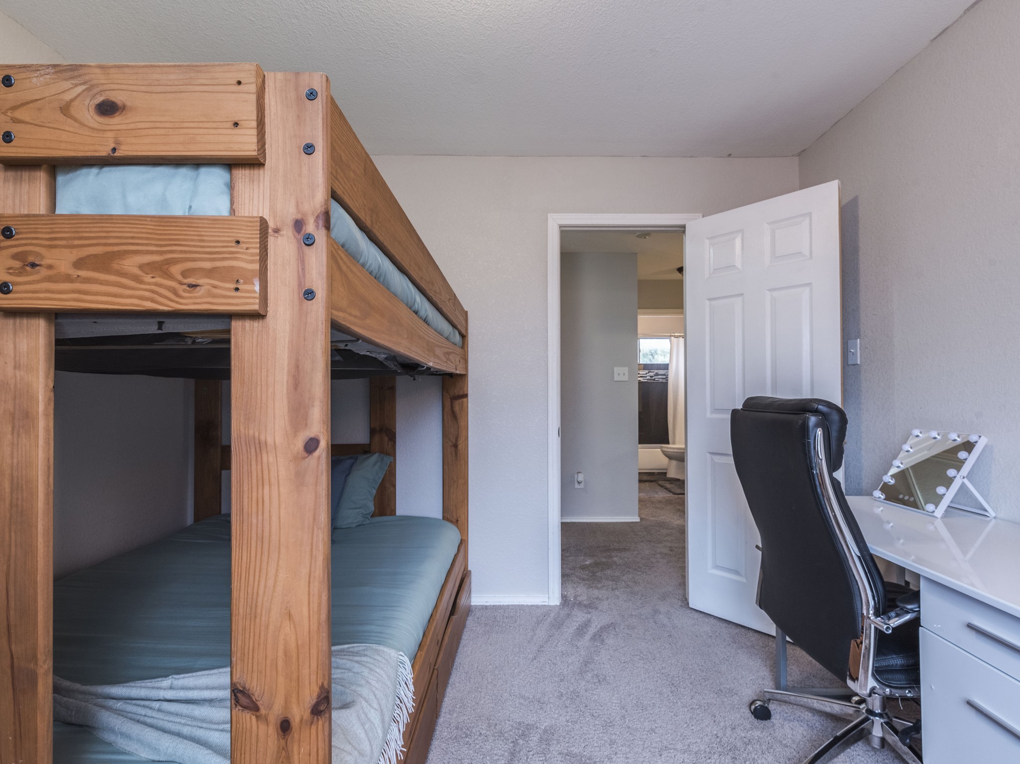 1415 Roxanne's Run Pflugerville, TX 78660 - Photo 21 of 30 Bunk beds offer versatile sleeping arrangements within this cozy bedroom space.
