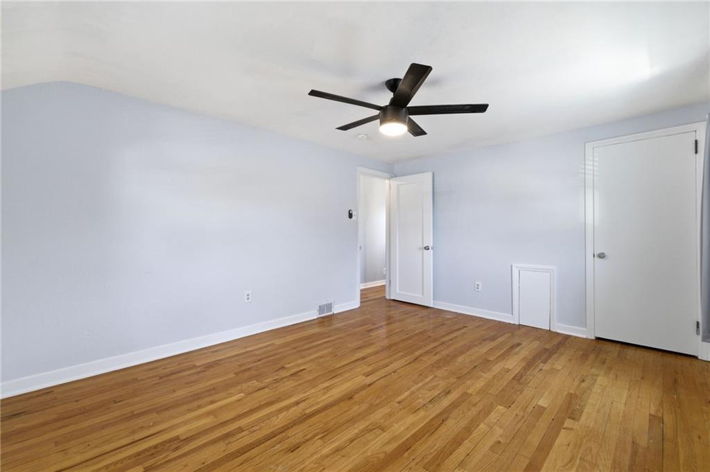 4883 East Willock Road Pittsburgh, PA 15227 - Photo 18 of 33 a view of a big room with wooden floor and windows
