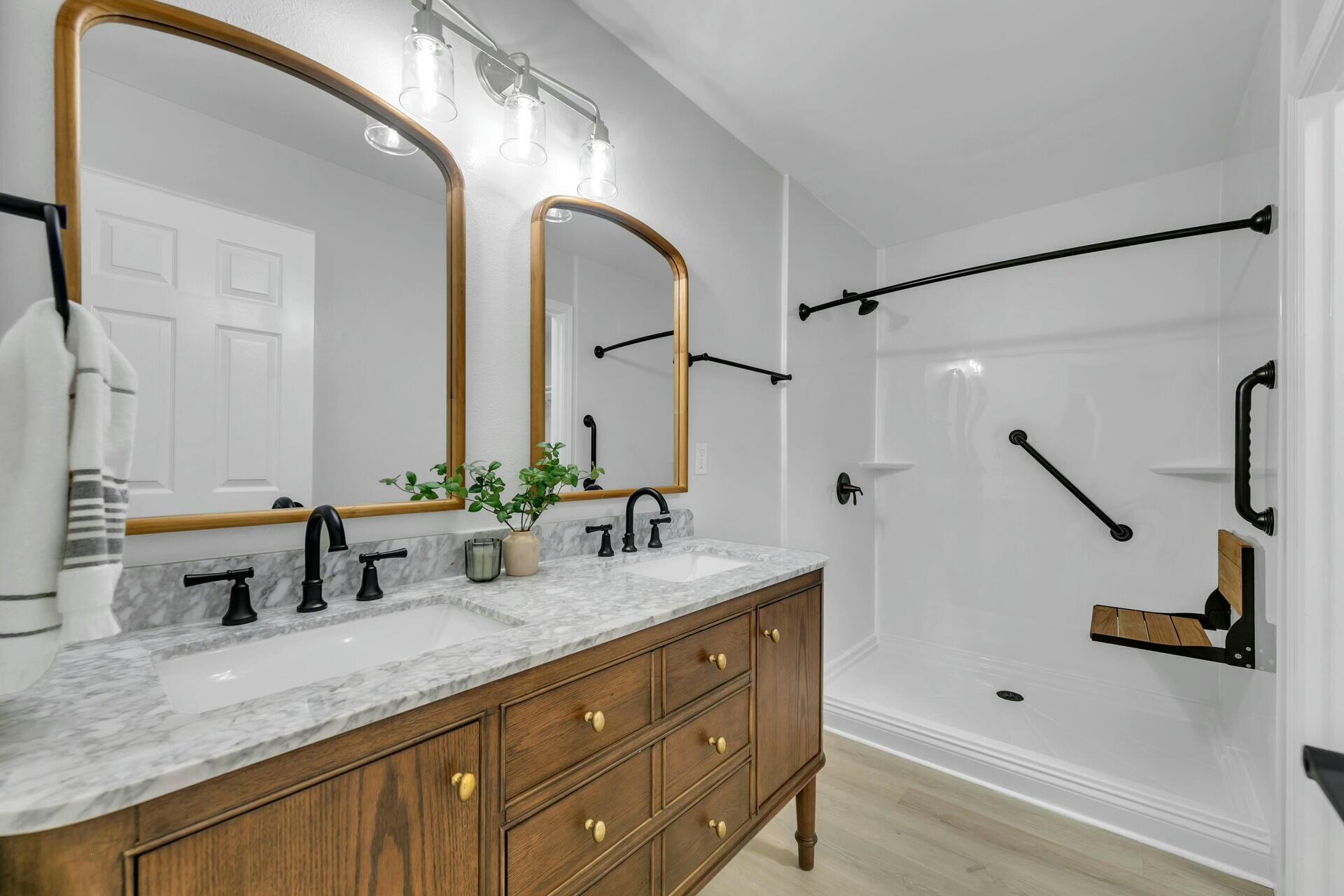 330 Apple Drive Crestview, FL 32536 - Photo 18 of 29 a bathroom with double vanity sink and mirror