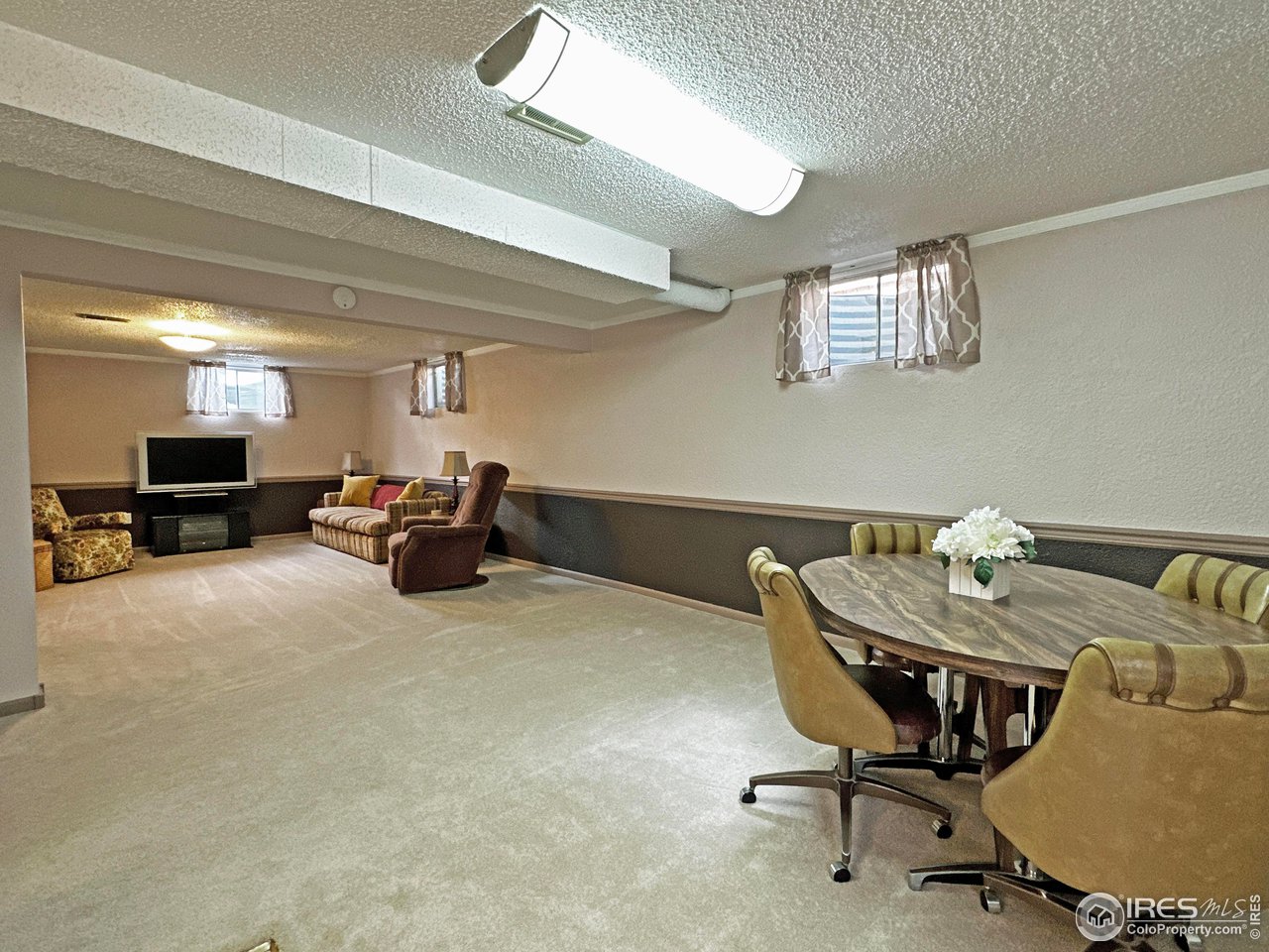 807 Locust Street Windsor, CO 80550 - Photo 24 of 40 a view of a workspace with furniture