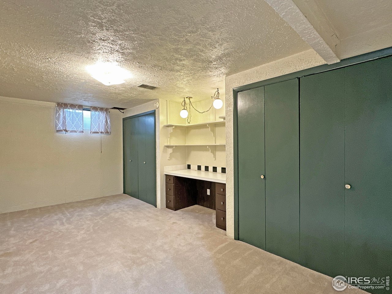 807 Locust Street Windsor, CO 80550 - Photo 28 of 40 a bathroom with a bathtub and a double vanity sink