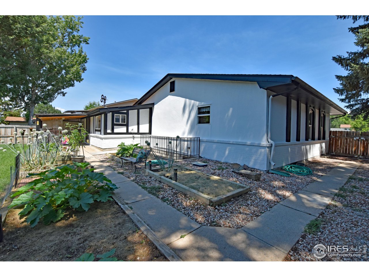 807 Locust Street Windsor, CO 80550 - Photo 36 of 40 a house view with a backyard space