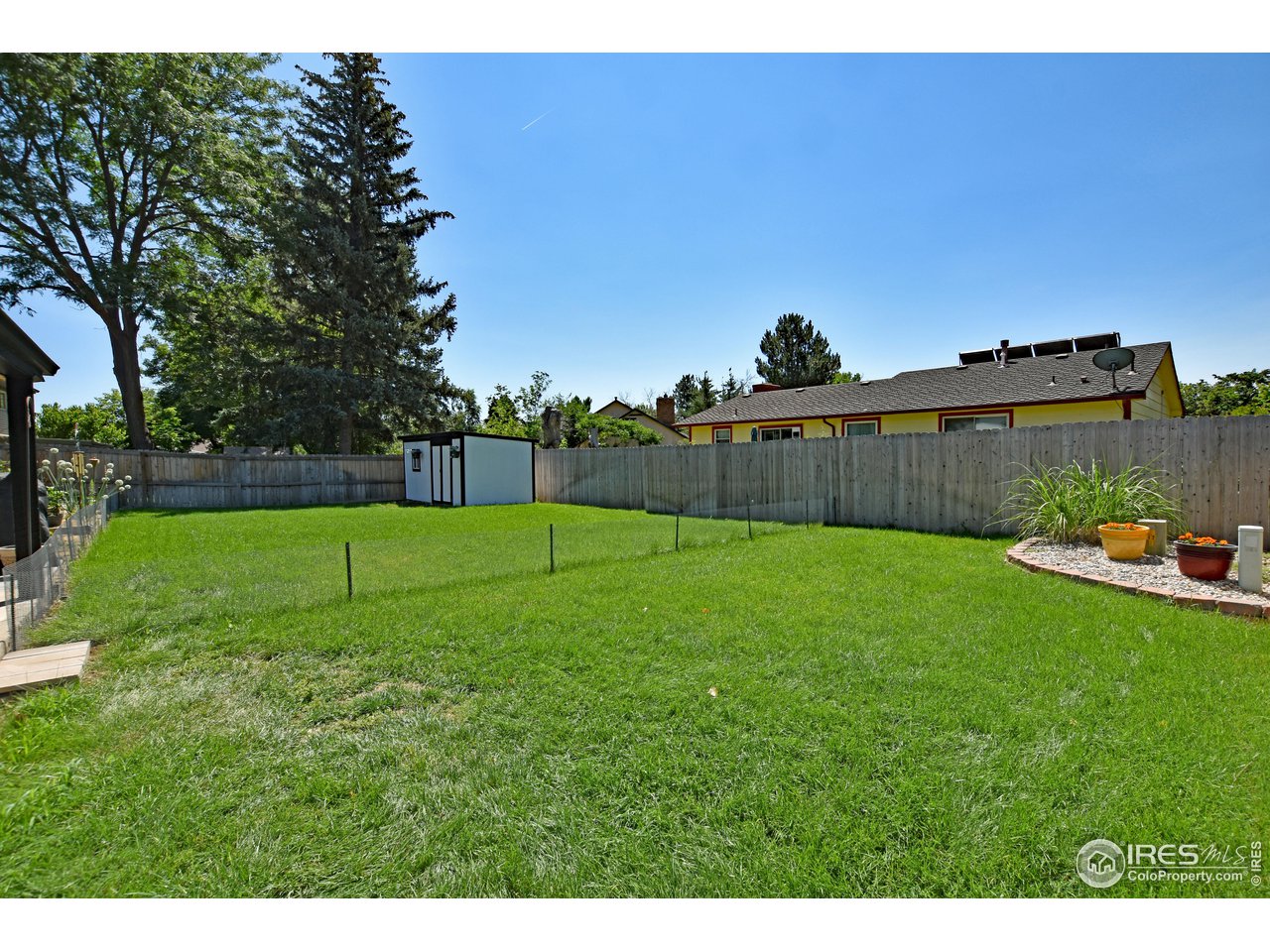 807 Locust Street Windsor, CO 80550 - Photo 39 of 40 a view of a tennis court