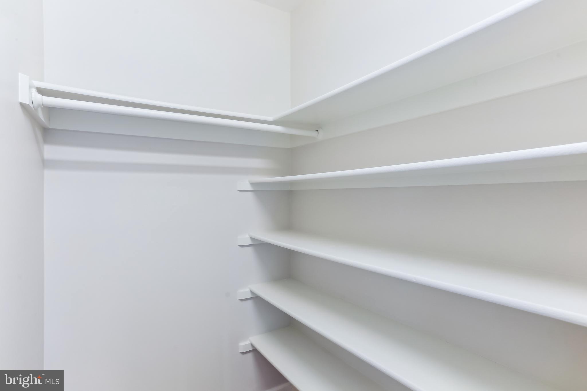 9409 Thornedike Drive Laytonsville, MD 20882 - Photo 12 of 86 a view of an empty racks on the wall