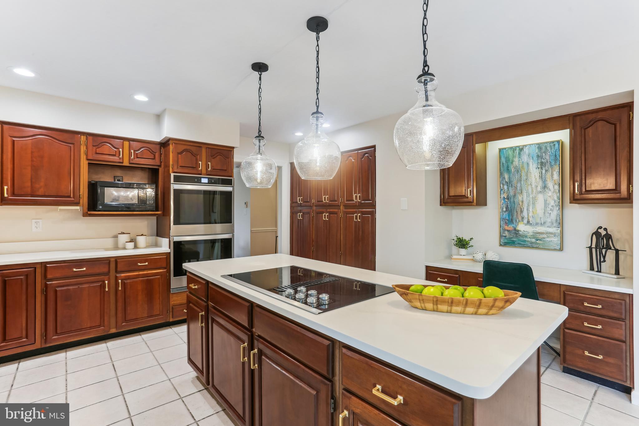 9409 Thornedike Drive Laytonsville, MD 20882 - Photo 2 of 86 a kitchen with stainless steel appliances granite countertop a sink a stove and a wooden floors