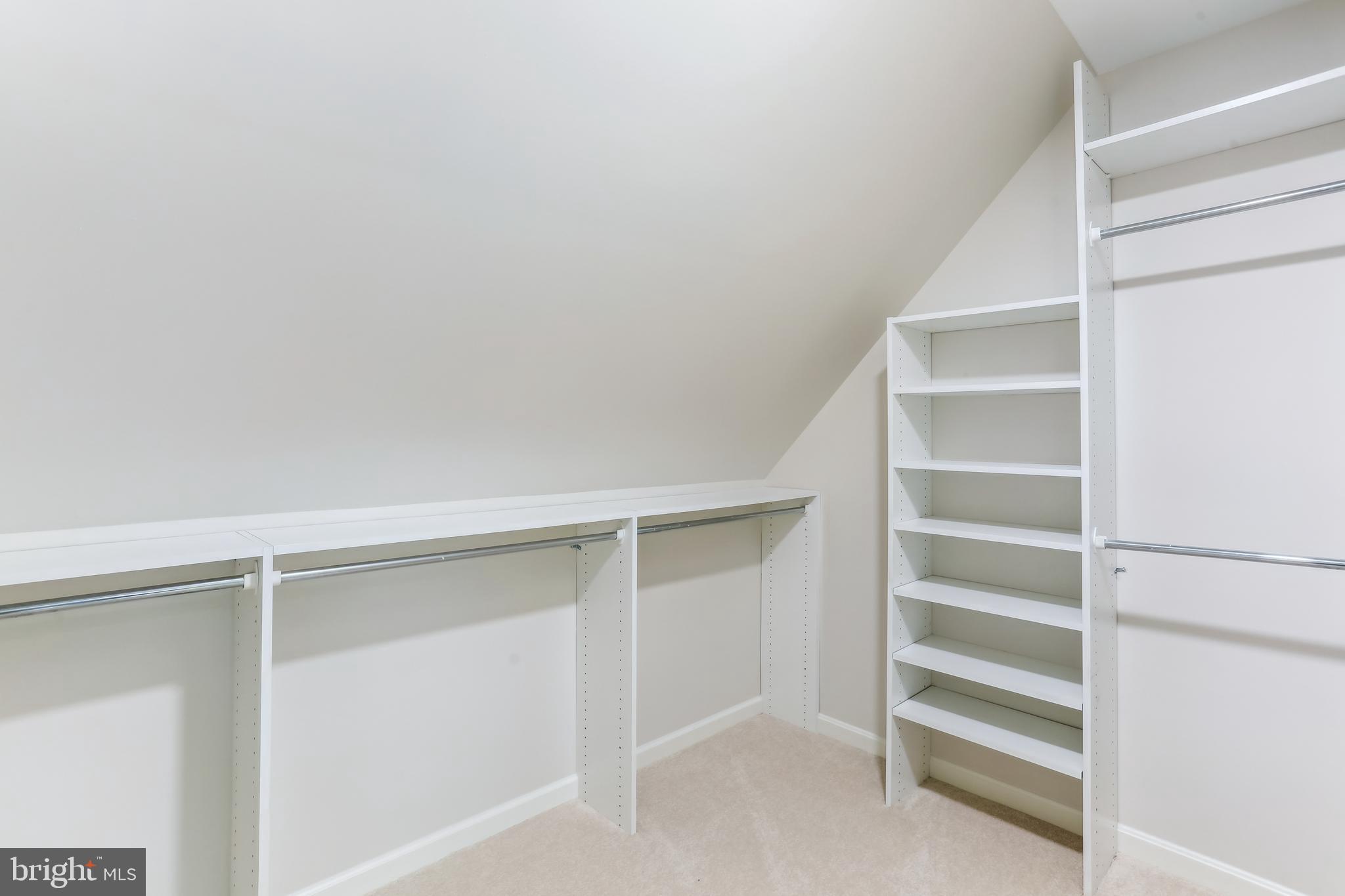 9409 Thornedike Drive Laytonsville, MD 20882 - Photo 46 of 86 a view of walk in closet with empty racks