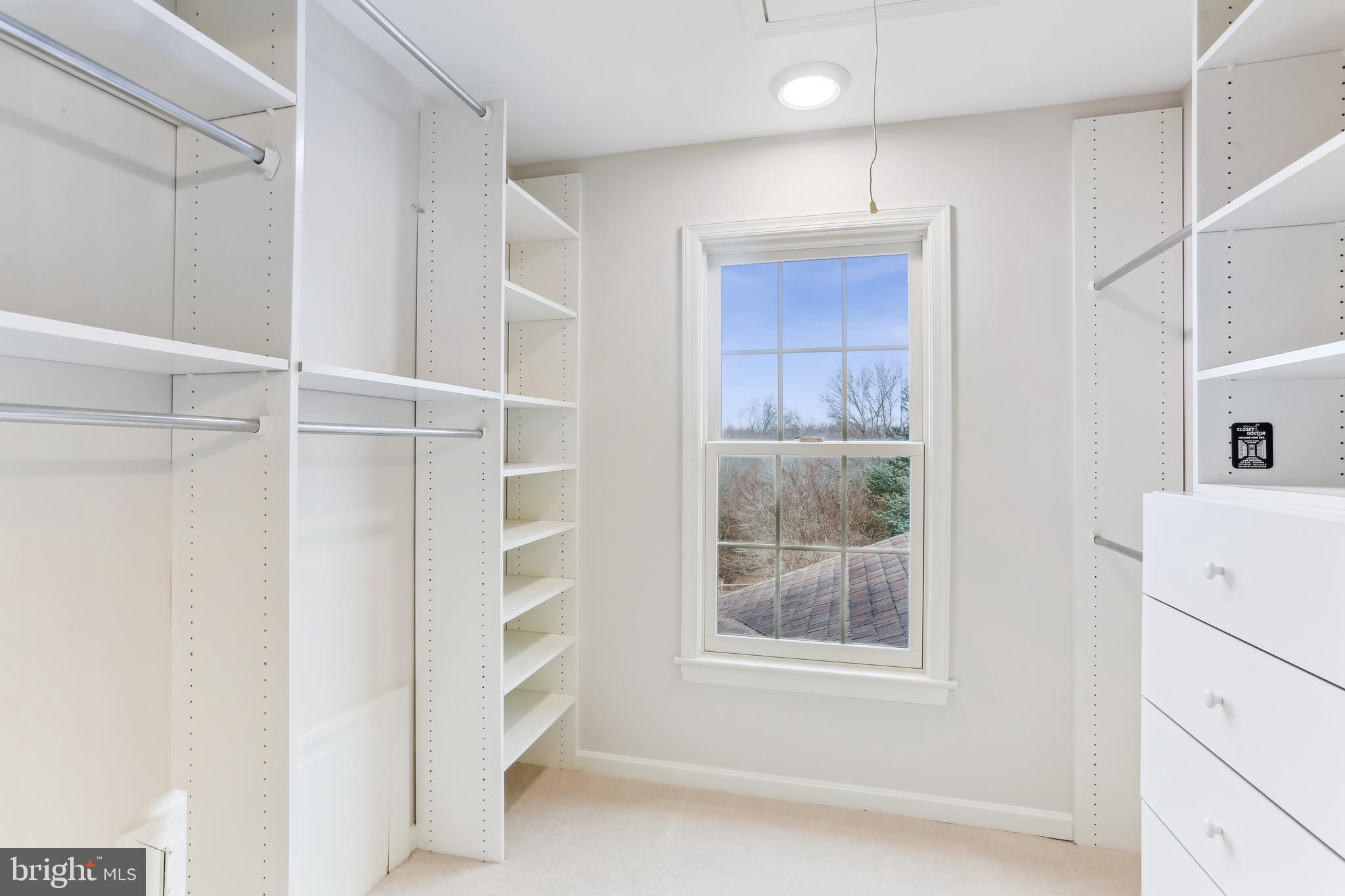 9409 Thornedike Drive Laytonsville, MD 20882 - Photo 47 of 86 a view of an empty room with a window