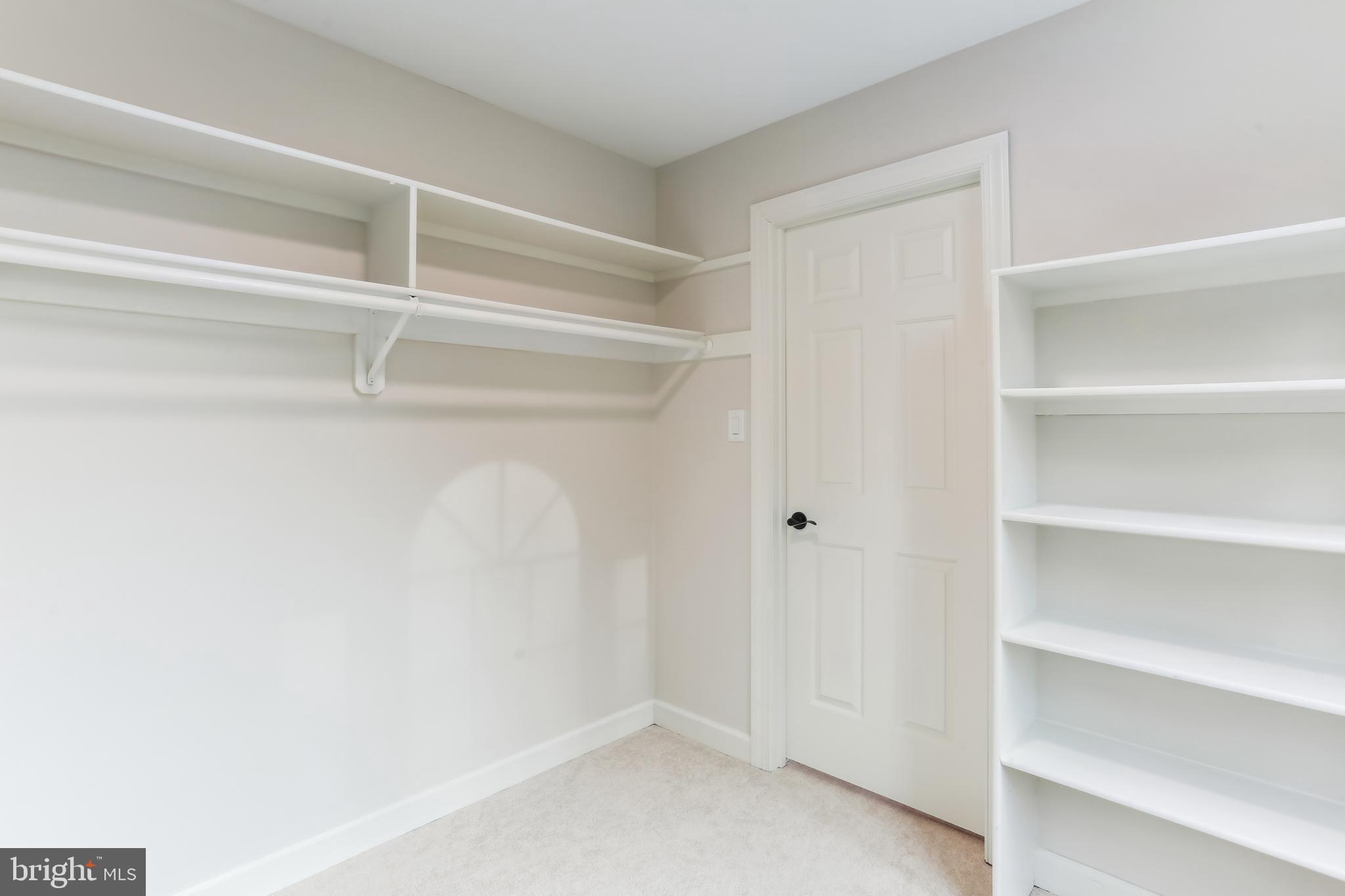 9409 Thornedike Drive Laytonsville, MD 20882 - Photo 58 of 86 a view of an empty walk in closet