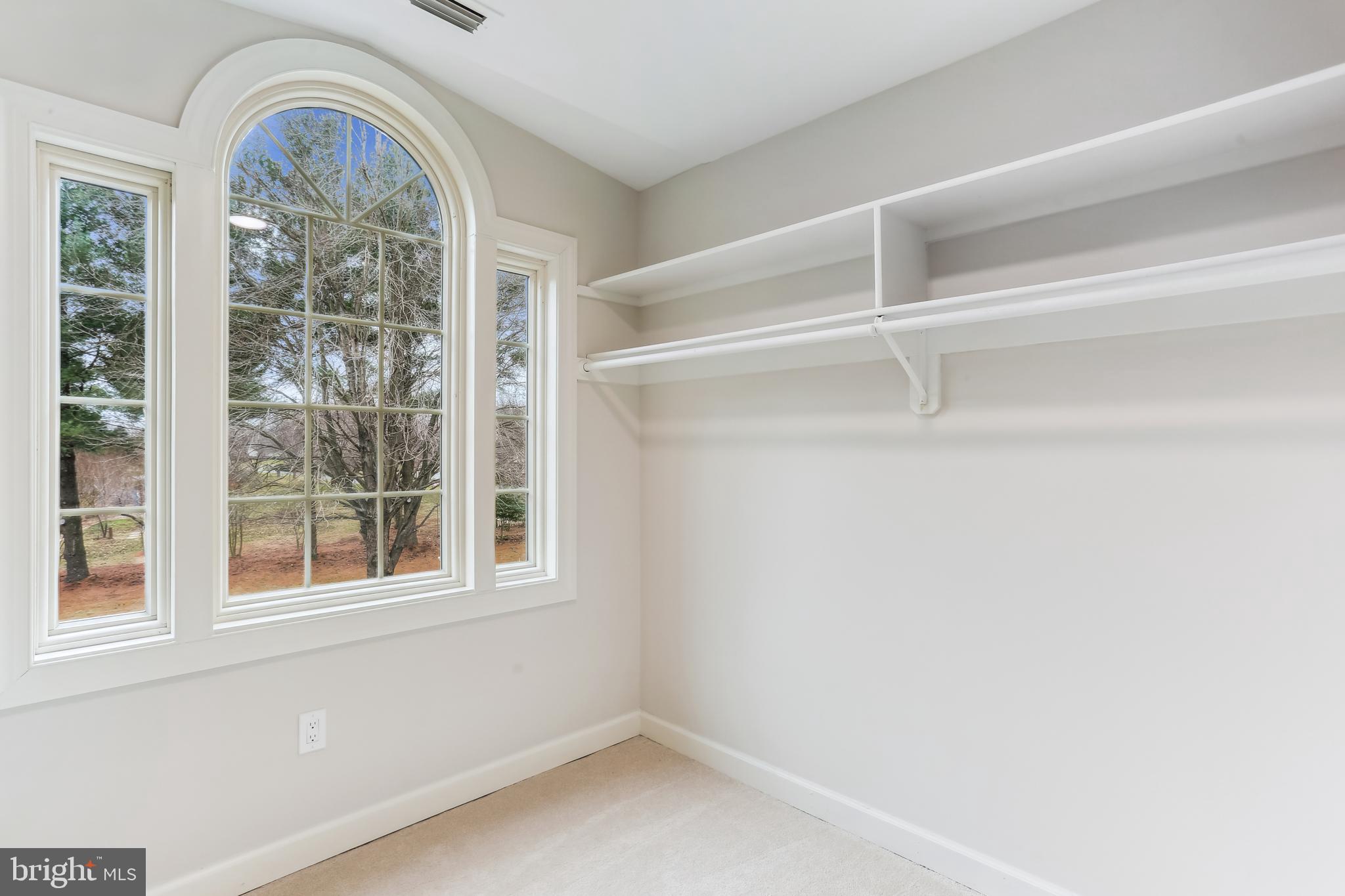 9409 Thornedike Drive Laytonsville, MD 20882 - Photo 59 of 86 a view of empty room with windows