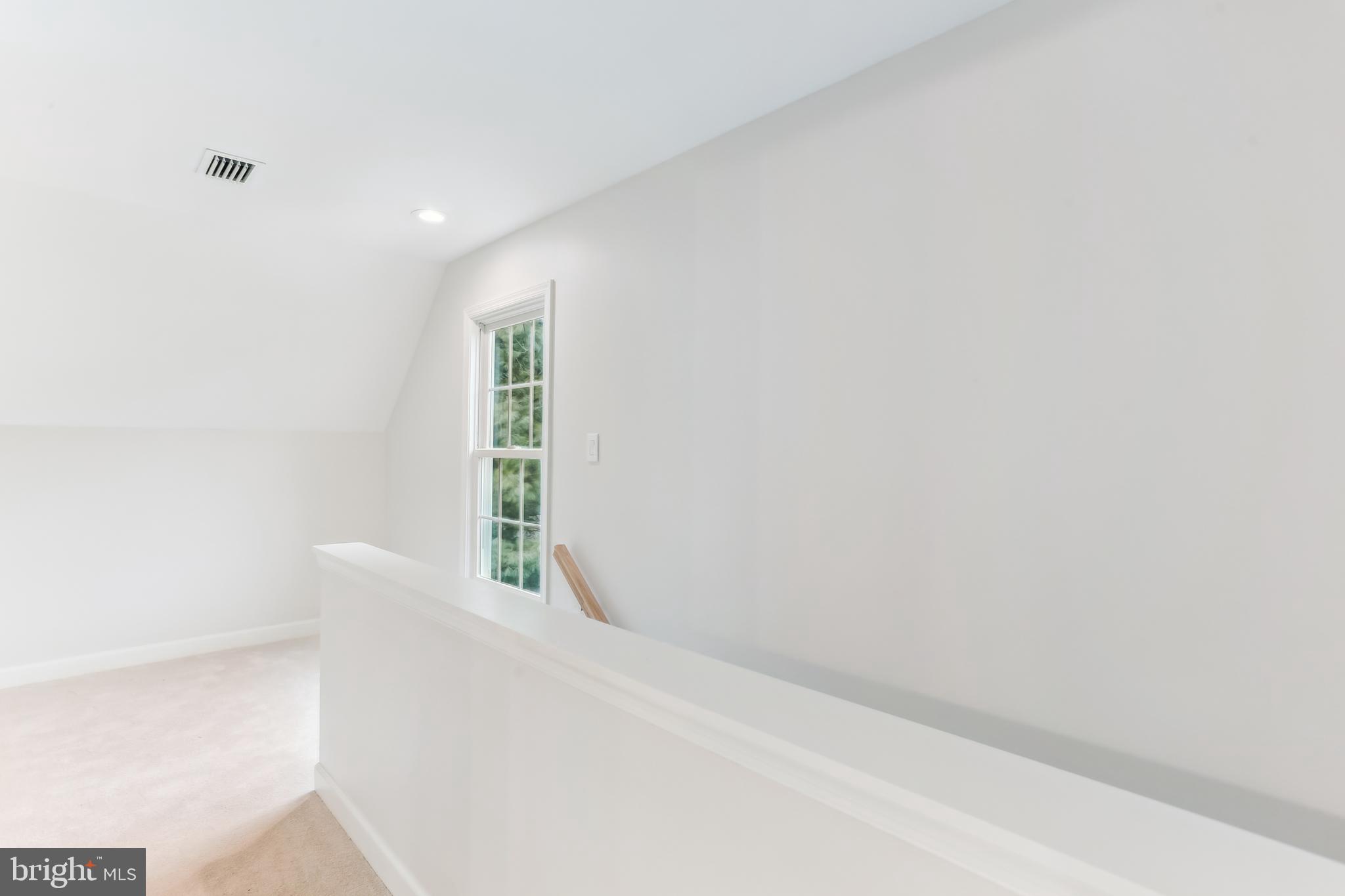 9409 Thornedike Drive Laytonsville, MD 20882 - Photo 60 of 86 a view of an empty room