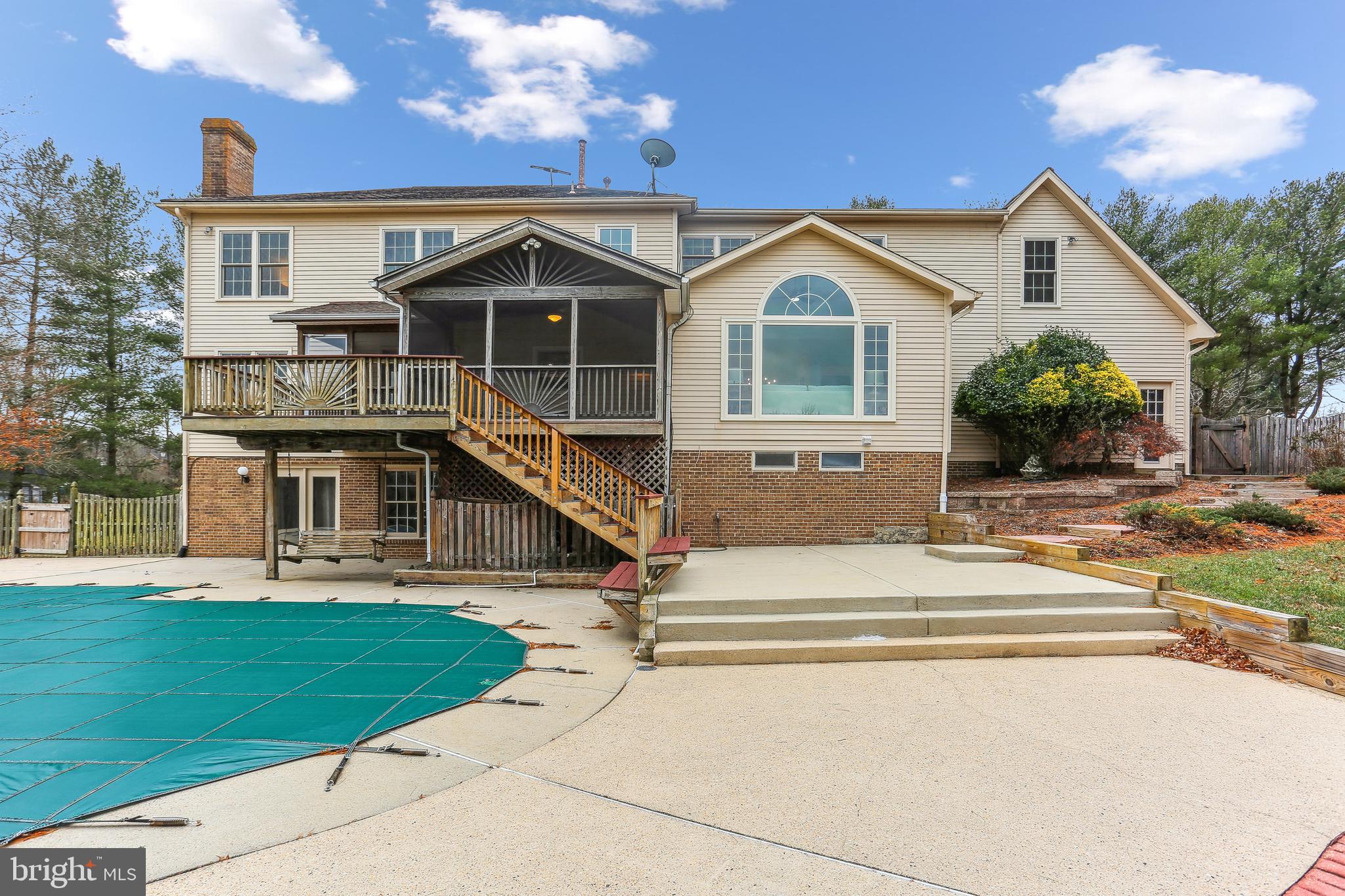 9409 Thornedike Drive Laytonsville, MD 20882 - Photo 78 of 86 a front view of a house with a yard