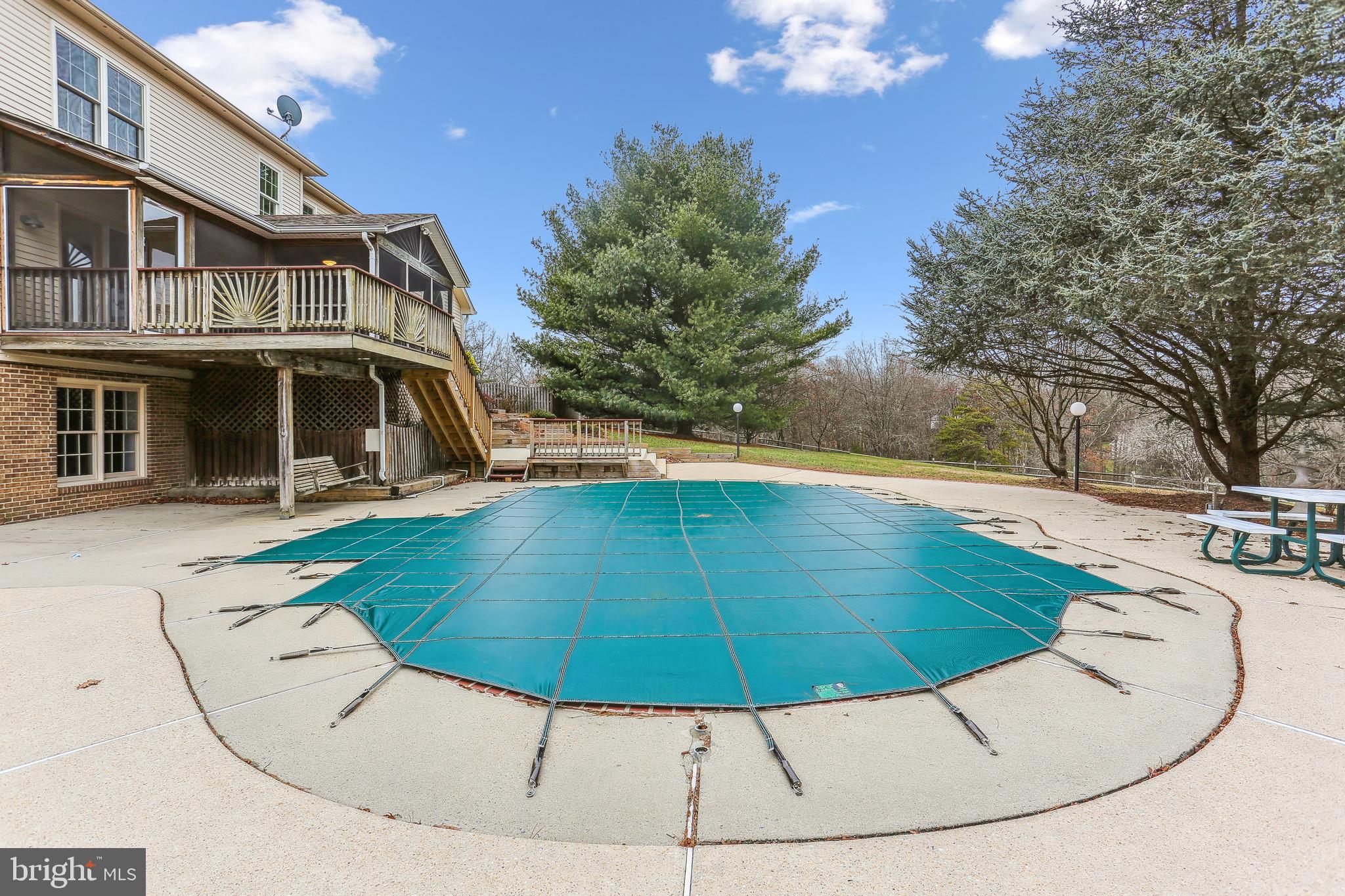 9409 Thornedike Drive Laytonsville, MD 20882 - Photo 82 of 86 Pool in winter with included Loop-loc cover