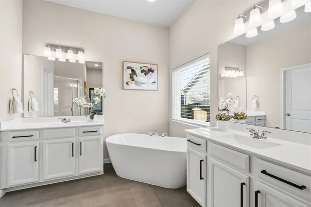 a bedroom with a bed and a walk in closet