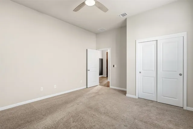 an empty room with a bathroom