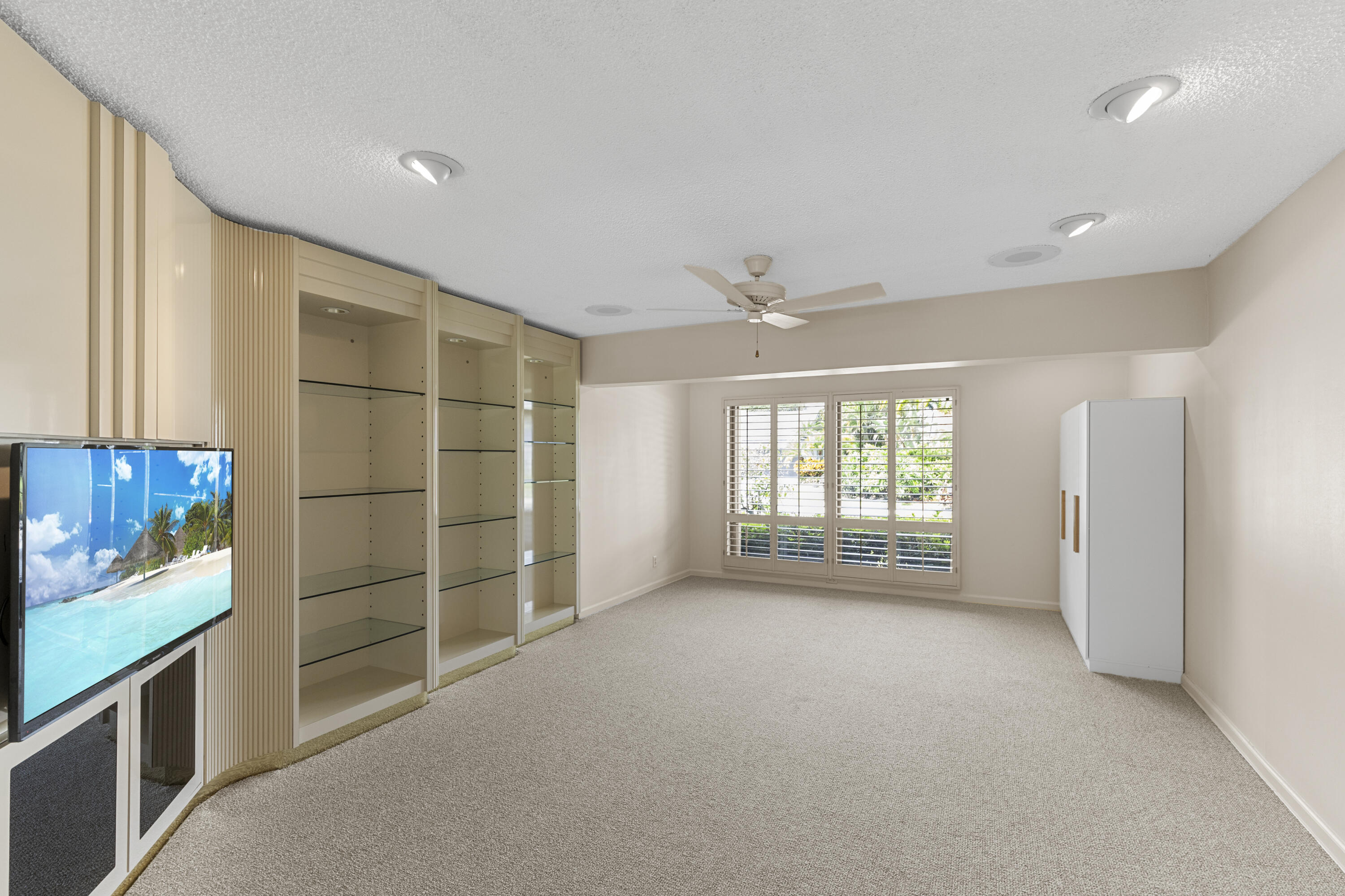 Undisclosed Address Delray Beach, FL 33445 - Photo 13 of 44 a view of an empty room with a window