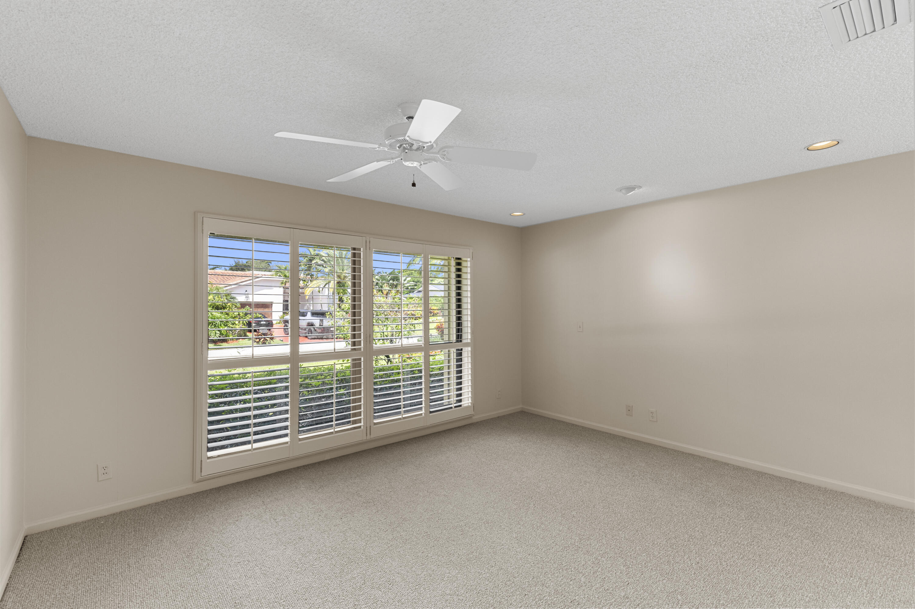 Undisclosed Address Delray Beach, FL 33445 - Photo 15 of 44 a view of an empty room with a window