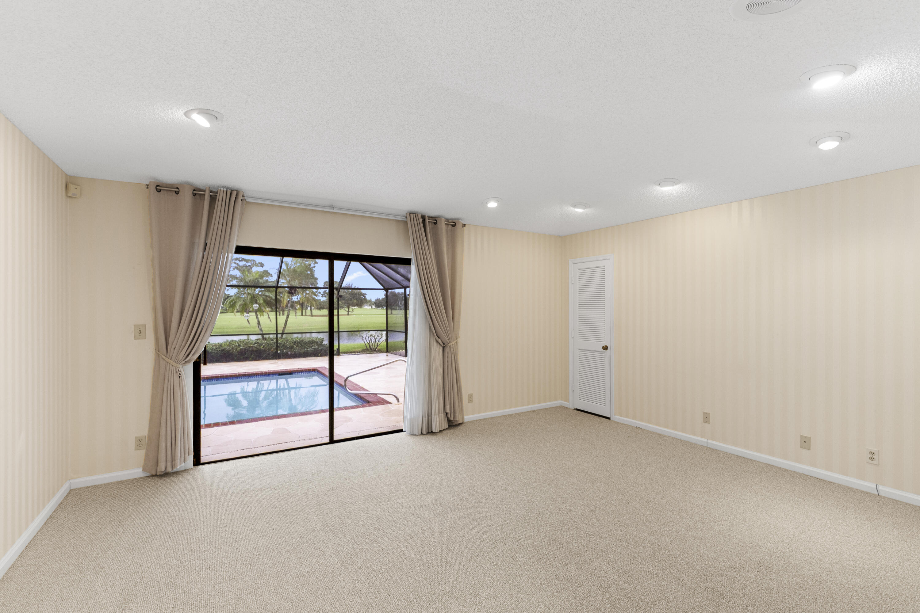Undisclosed Address Delray Beach, FL 33445 - Photo 20 of 44 a view of an empty room with a window