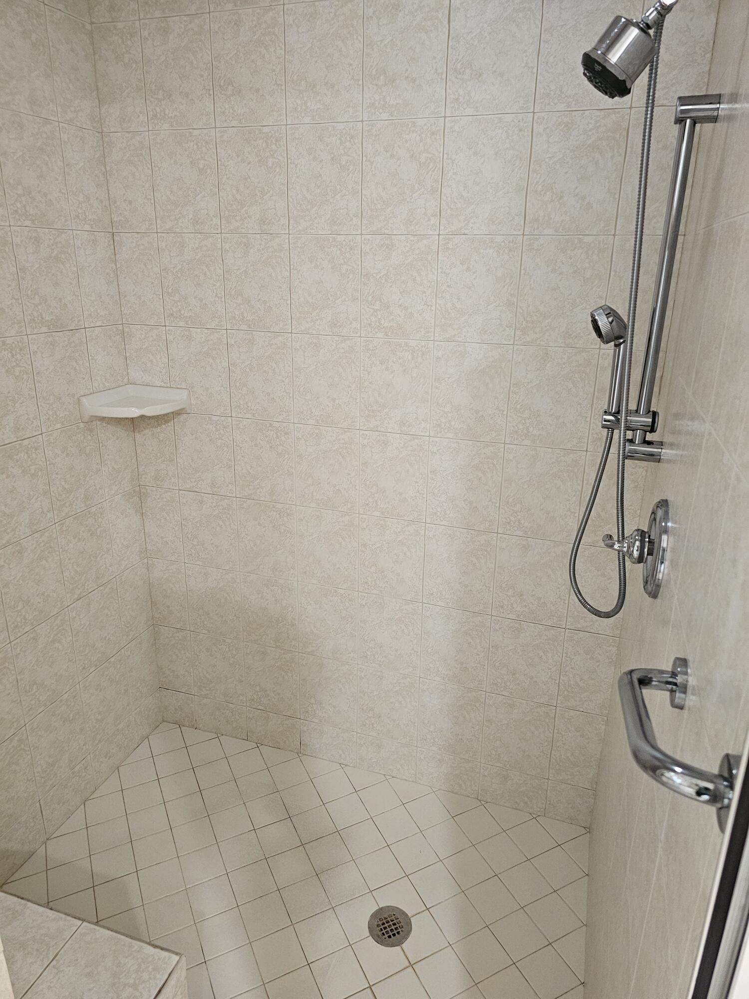 Undisclosed Address Delray Beach, FL 33445 - Photo 25 of 44 Primary Shower & Seat