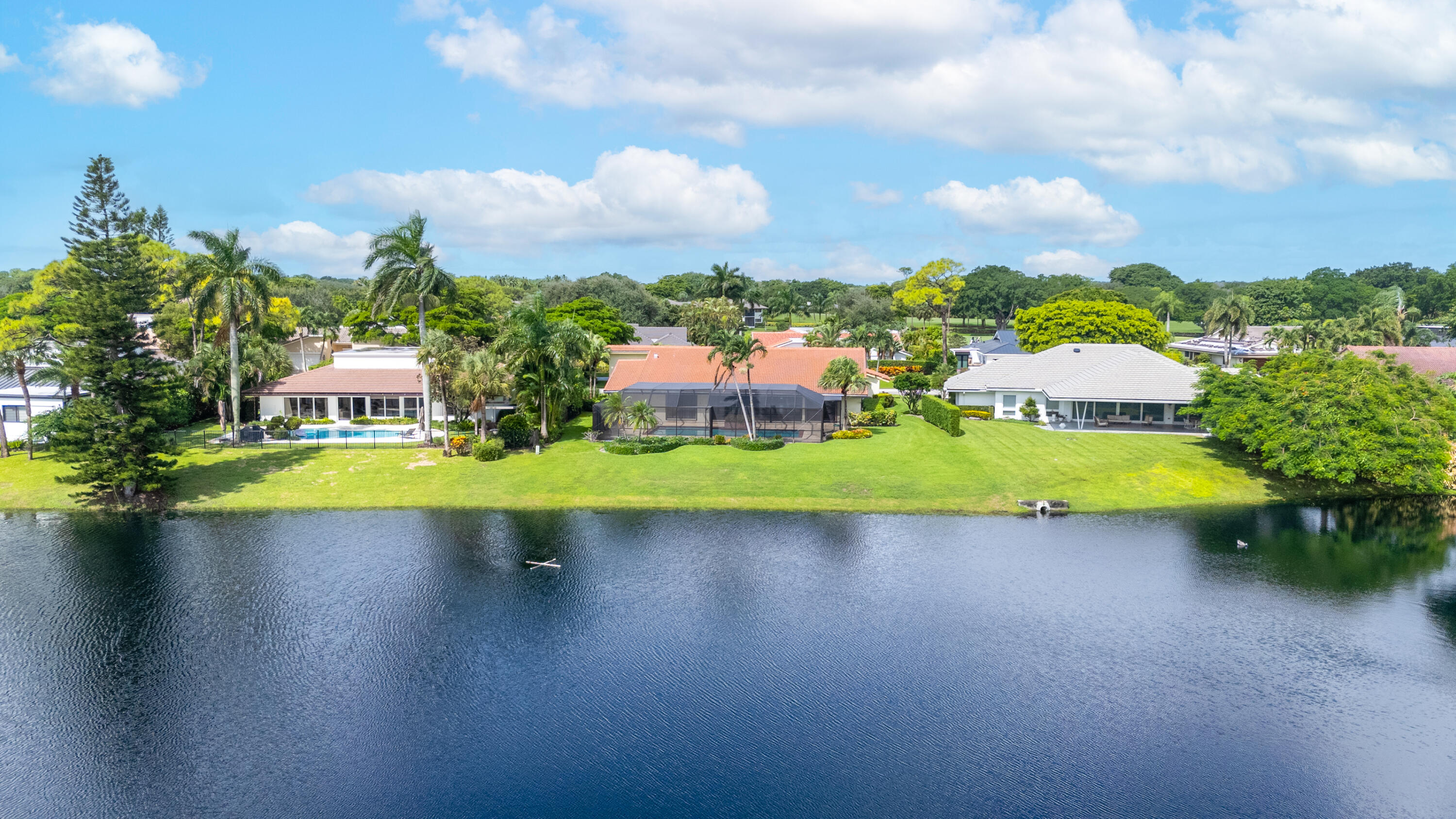 Undisclosed Address Delray Beach, FL 33445 - Photo 32 of 44 a view of a house with pool yard and outdoor seating