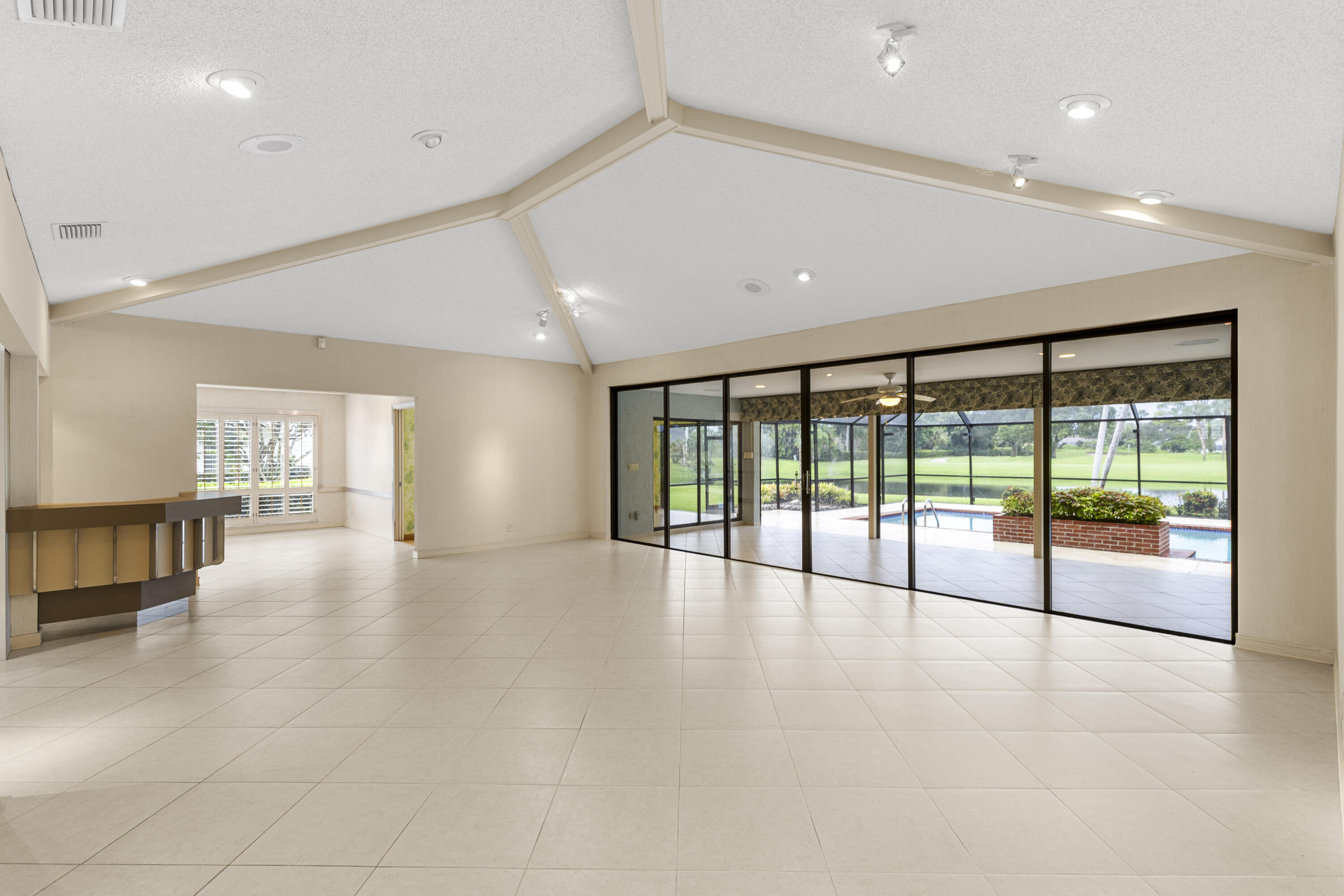 Undisclosed Address Delray Beach, FL 33445 - Photo 7 of 44 a view of an empty room with a window