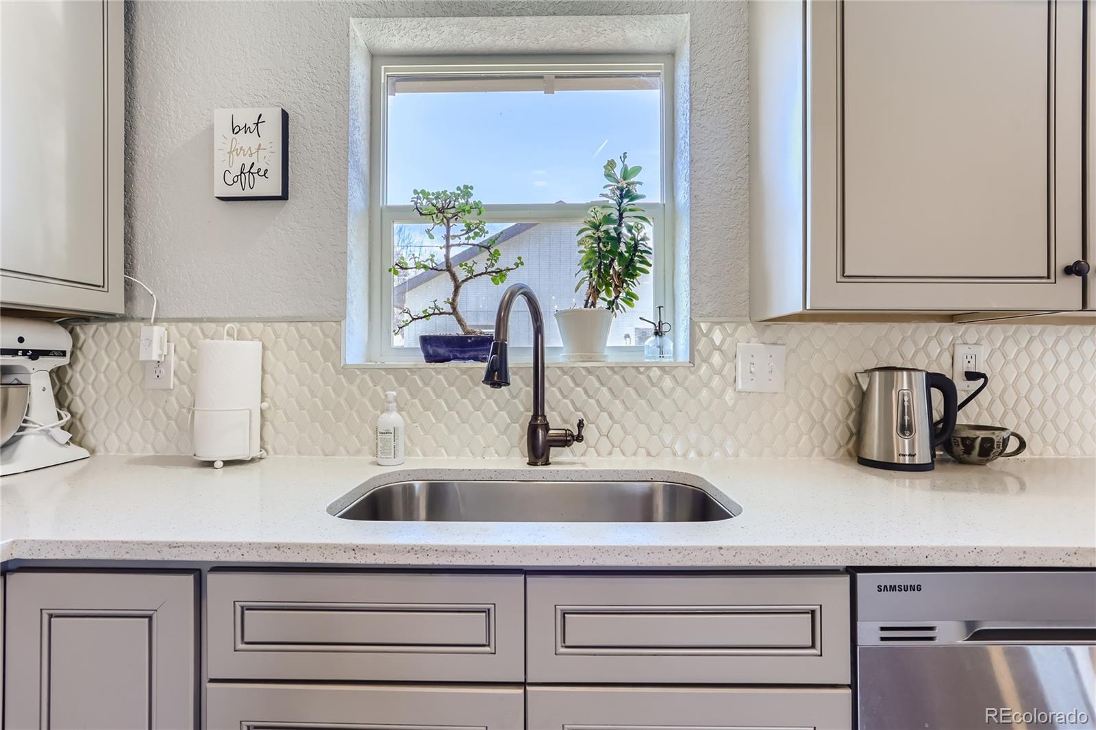 3051 Grape Street Denver, CO 80207 - Photo 15 of 33 a kitchen with a sink and a window