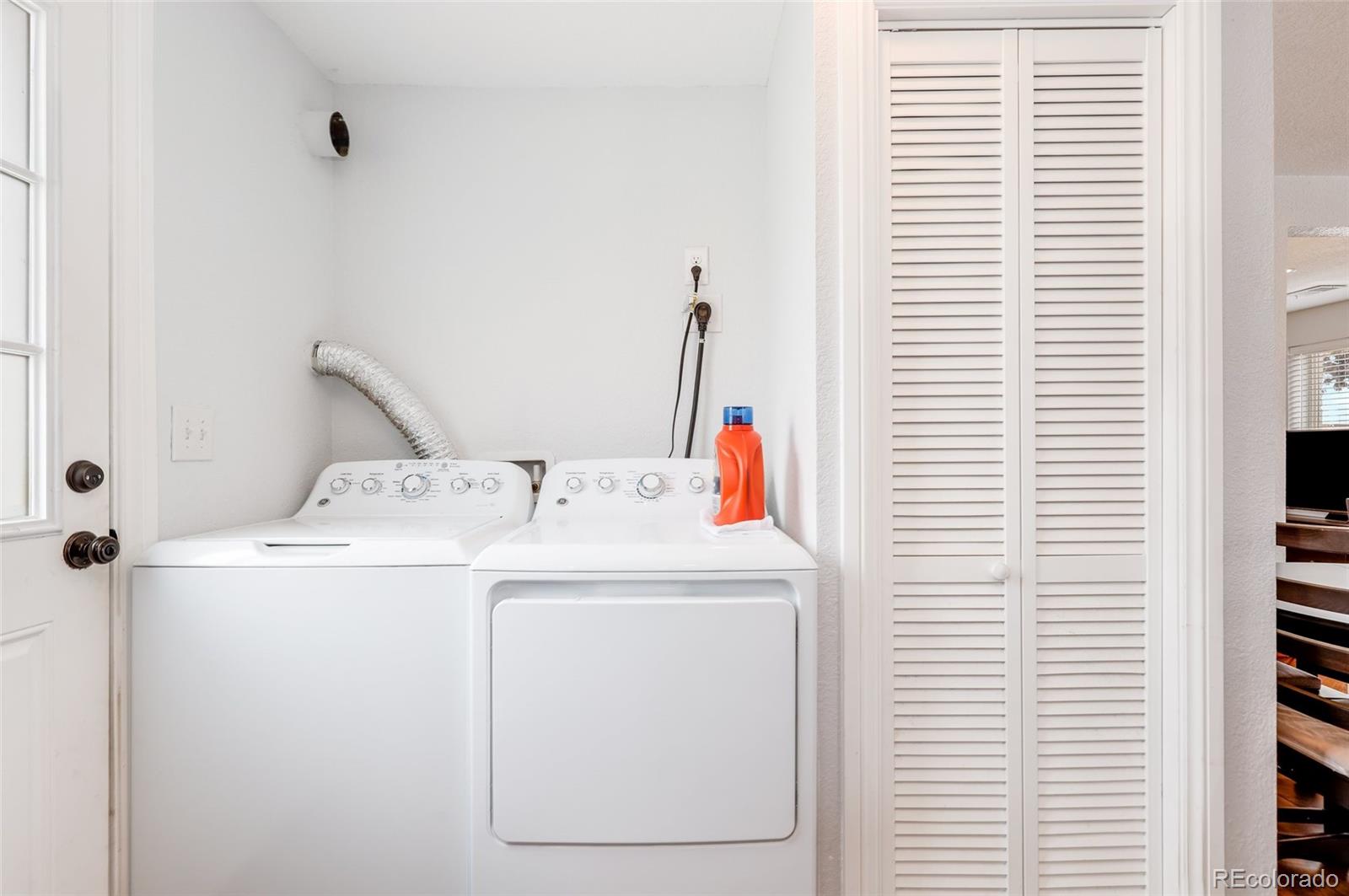 3051 Grape Street Denver, CO 80207 - Photo 18 of 33 a utility room with dryer and washer