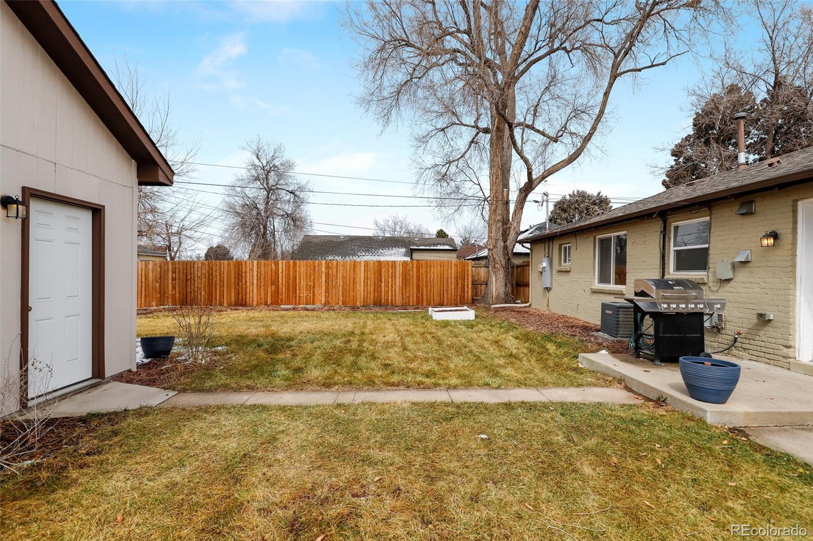 3051 Grape Street Denver, CO 80207 - Photo 26 of 33 a view of backyard of house