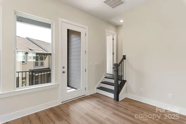 a view of an entryway with stairs