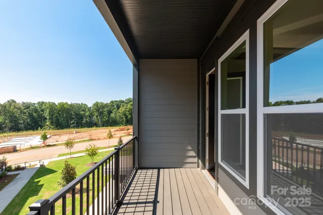a view of a balcony with an ocean view