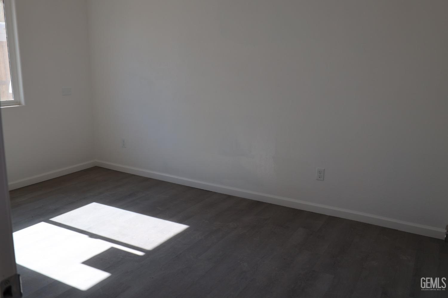 Undisclosed Address Bakersfield, CA 93307 - Photo 9 of 12 an empty room with a empty space