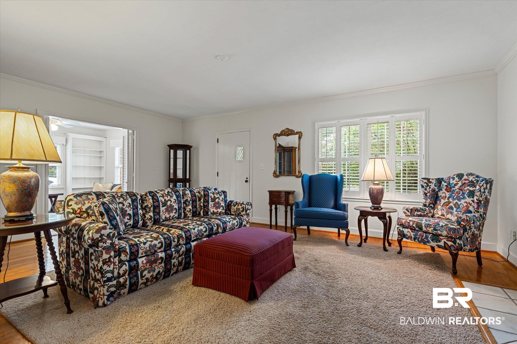 300 Woodlands Avenue Mobile, AL 36607 - Photo 5 of 23 Living area with crown molding and wood finished floors