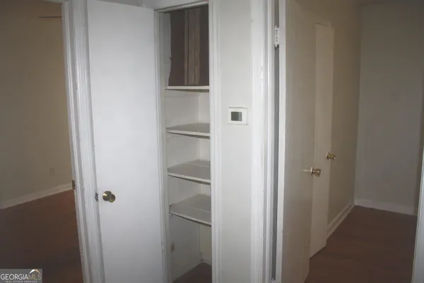 a view of small space with wooden floor