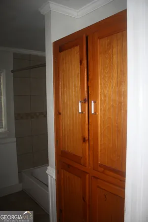 a bathroom with a sink and vanity