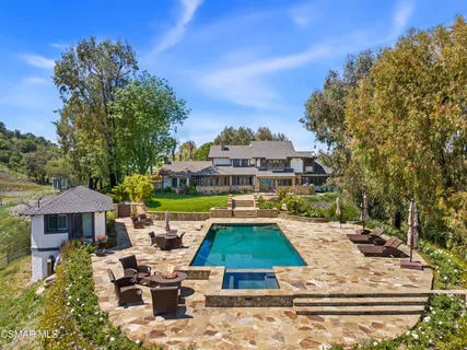 a view of a yard with an outdoor space