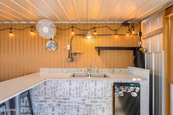 a view of a hallway with washer and dryer