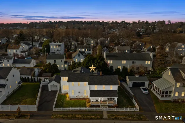 an aerial view of a town with residential houses