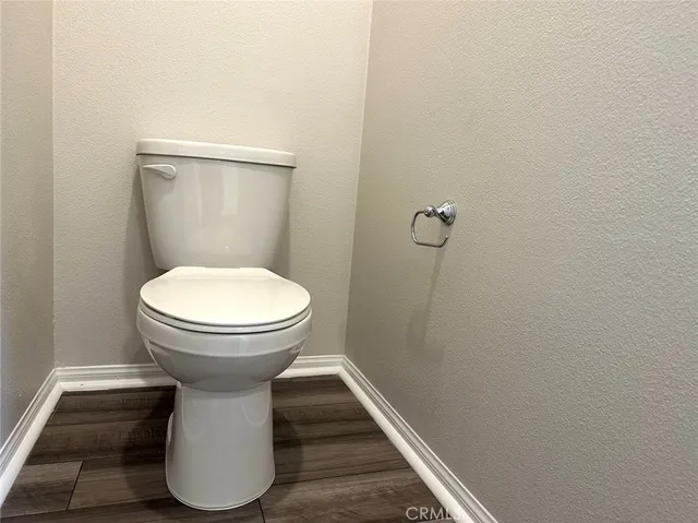 a bathroom with a toilet and a sink