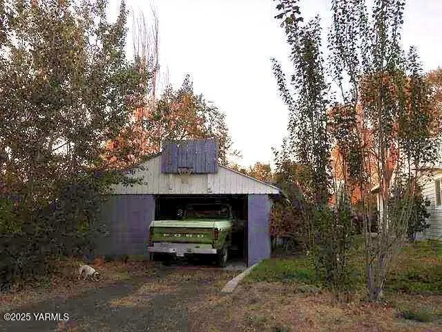 a car parked in front of a house