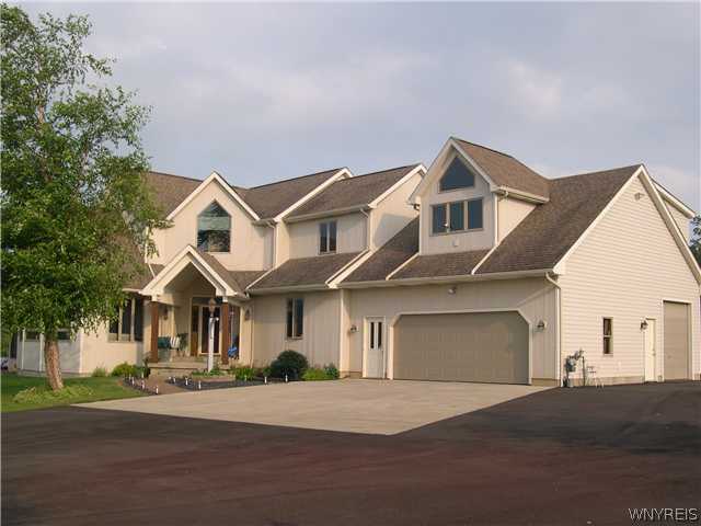 1390 Bullis Road Elma, NY 14059 - Photo 1 of 1 Exterior Front FRONT AND SIDE VIEW SHOWING 3 CAR G