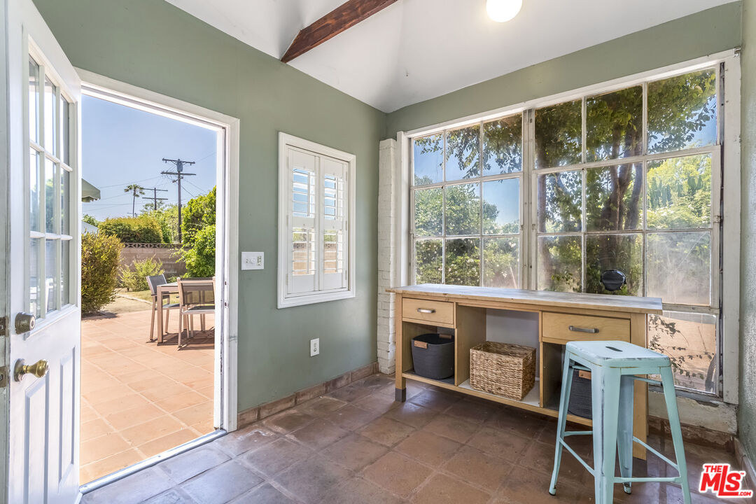 5967 Carpenter Avenue Valley Village, CA 91601 - Photo 25 of 32 a room with furniture and large windows