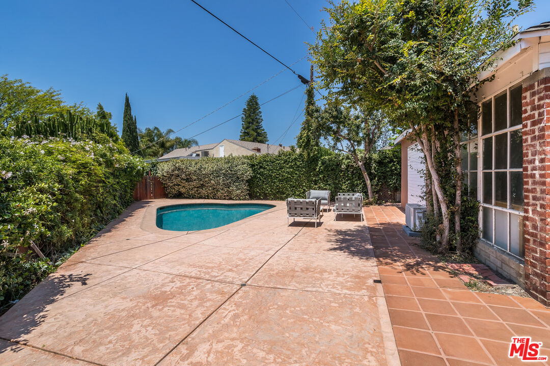 5967 Carpenter Avenue Valley Village, CA 91601 - Photo 28 of 32 a view of a backyard with sitting area