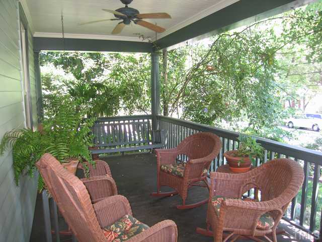 115 North Bloodworth Street Raleigh, NC 27601 - Photo 12 of 25 Porches are part of the soul of Historic Oakwood. Theirs is ringed with Old Blush climbing roses intermingled with the old Southern evergreen vine Smilex.