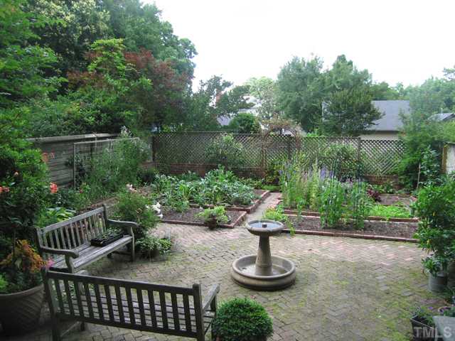 115 North Bloodworth Street Raleigh, NC 27601 - Photo 14 of 25 This garden is a poster perfect PARTERRE - An ornamental flower garden having beds and paths arranged to form a pattern.