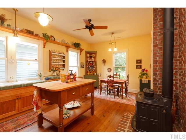 115 North Bloodworth Street Raleigh, NC 27601 - Photo 6 of 25 The house and gardens are gathering places for the Bright?s 10 grandchildren. The wood stove warmed, spacious kitchen-dining room is the center piece of the gatherings.