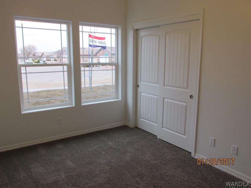 4276 East Cane Ranch Road Kingman, AZ 86401 - Photo 16 of 23 an empty room with windows