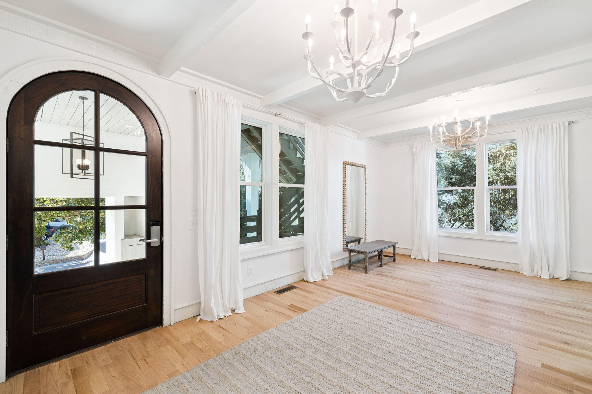 425 Beachfront Trail Santa Rosa Beach, FL 32459 - Photo 13 of 117 a spacious bedroom with a large bed and a large window