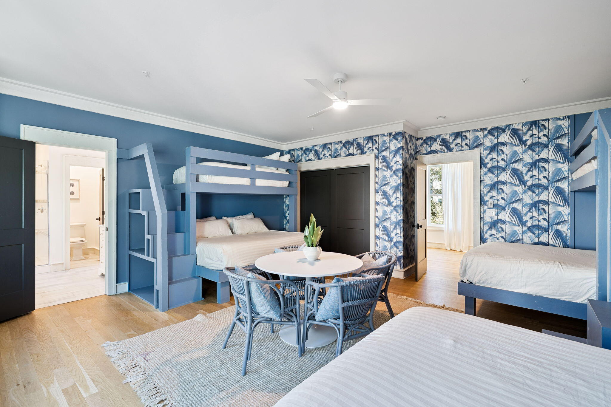 425 Beachfront Trail Santa Rosa Beach, FL 32459 - Photo 19 of 117 a view of a dining room with furniture and wooden floor