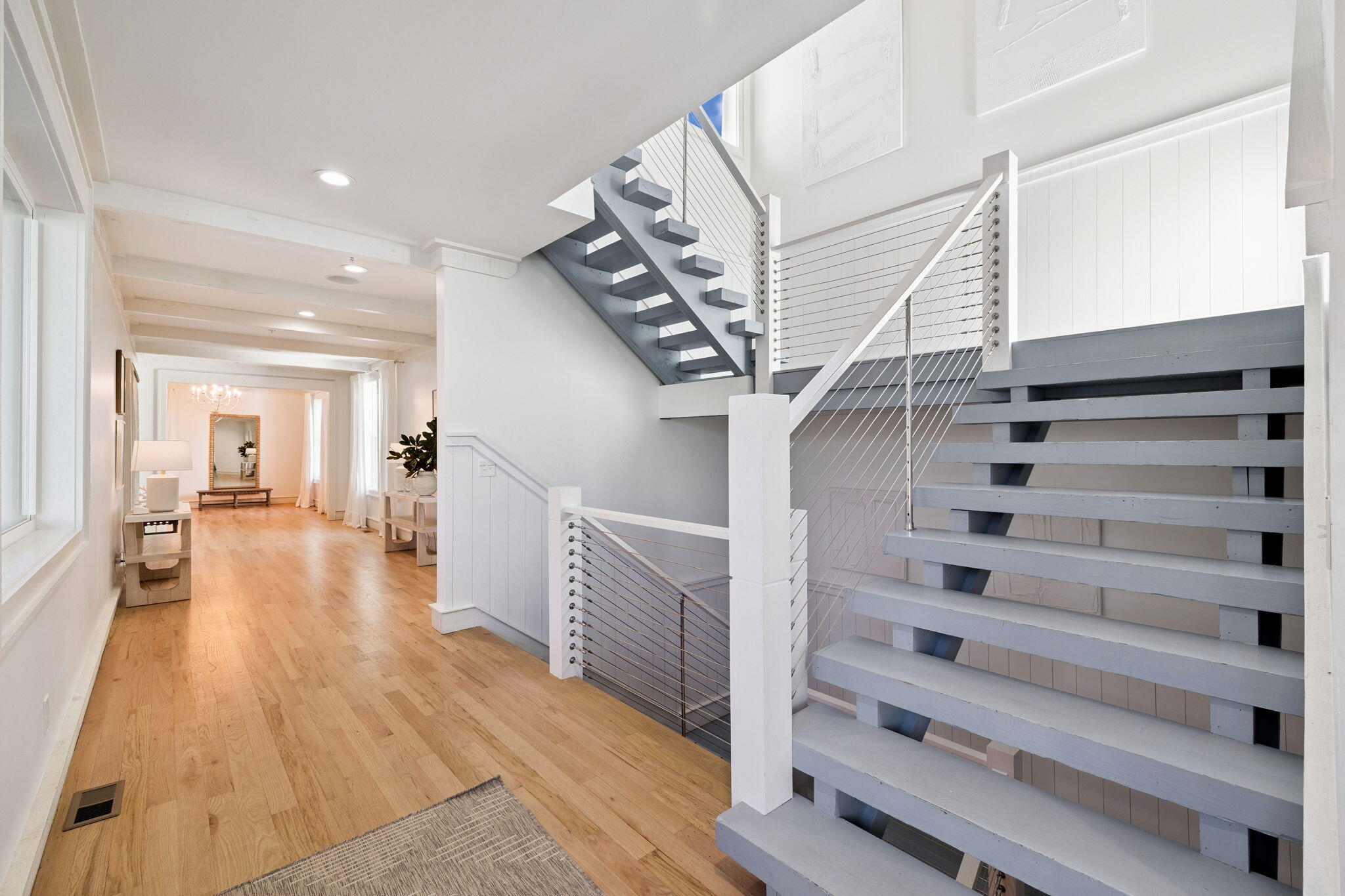 425 Beachfront Trail Santa Rosa Beach, FL 32459 - Photo 23 of 117 a view of entryway and hall with wooden floor
