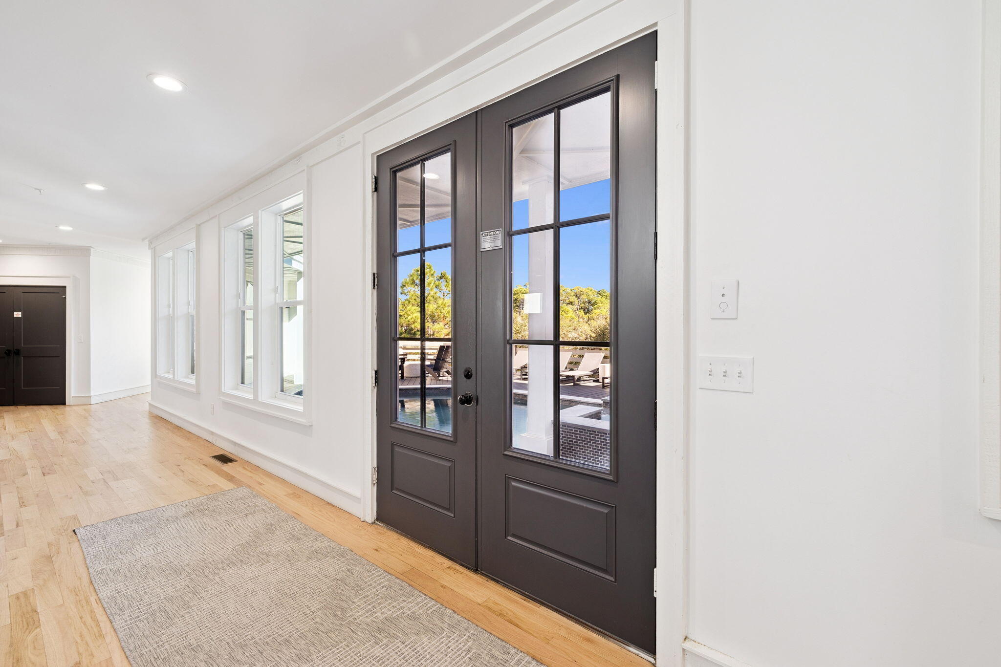 425 Beachfront Trail Santa Rosa Beach, FL 32459 - Photo 24 of 117 a view of an entryway with wooden floor