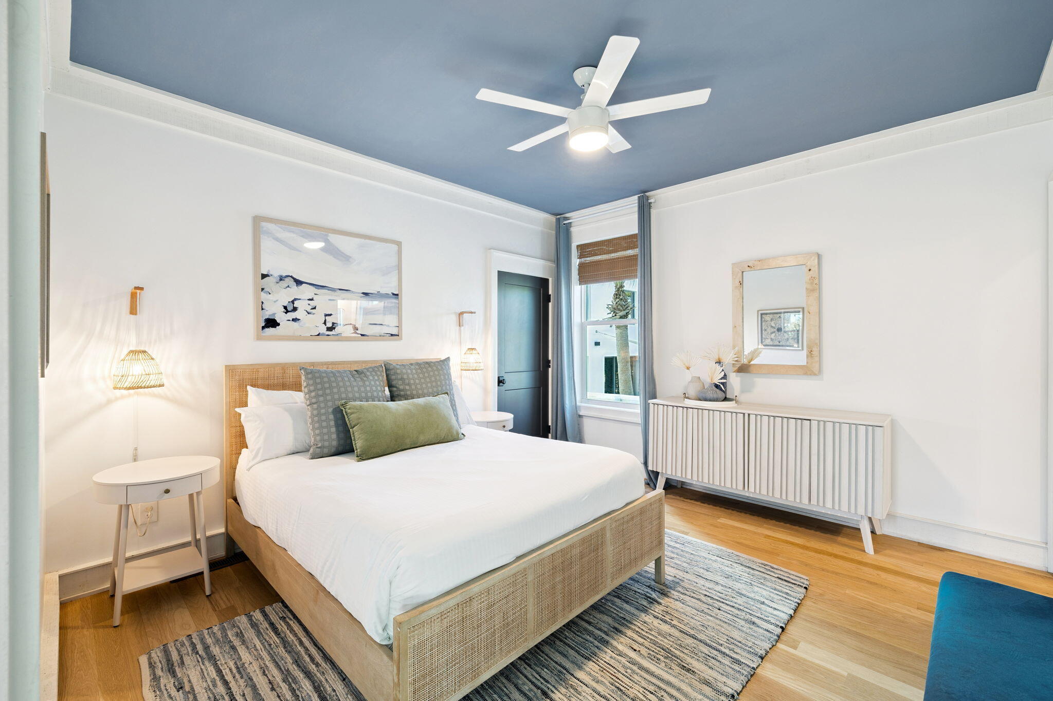 425 Beachfront Trail Santa Rosa Beach, FL 32459 - Photo 34 of 117 a bedroom with a large bed and a chandelier